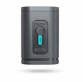 Gray electronic vacuum device with on/off switch on a white background